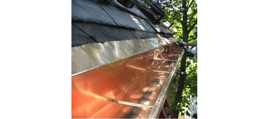 A close up of the gutter on a house